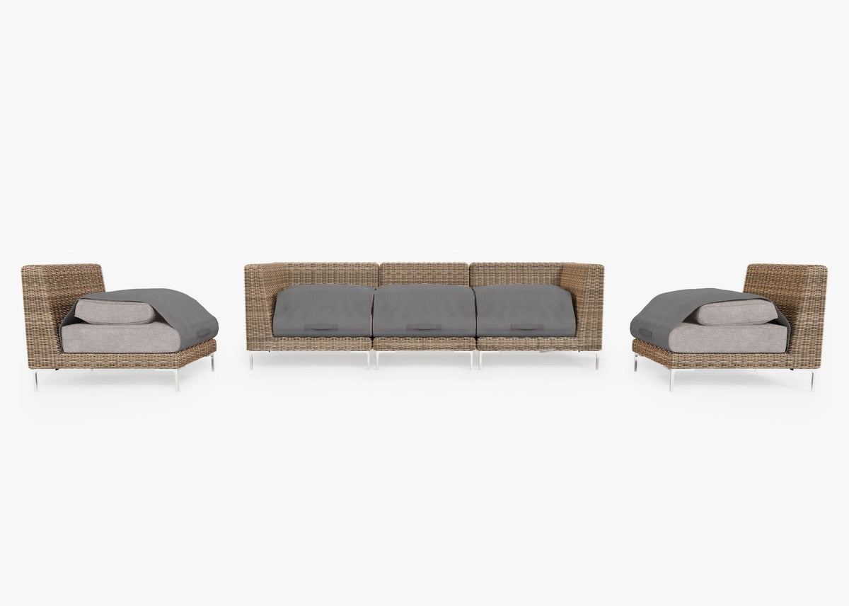 Handwoven brown wicker outdoor sofa set with three armless chairs and gray layered cushions, showcasing modular design.
