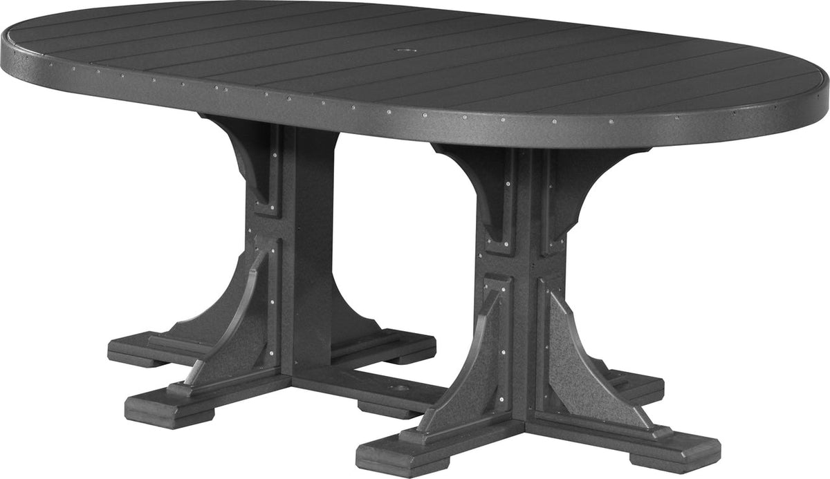 Dark gray oval dining table with a slatted top, designed to seat six, featuring a center umbrella hole and sturdy pedestal base.