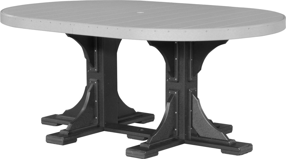 LuxCraft Deluxe Poly 4' x 6' oval dining table in gray, featuring sturdy black legs and an umbrella hole for easy shade.