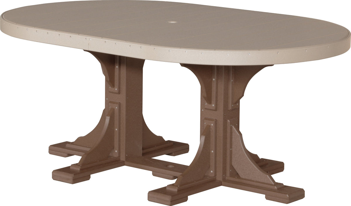 Oval dining table with a light beige top and brown legs, designed for outdoor use, featuring a center umbrella hole.