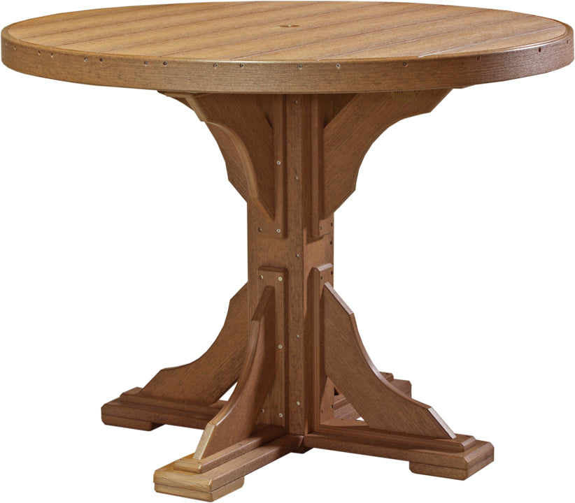 Round 48-inch patio table with a textured brown surface and sturdy, decorative base; includes an umbrella hole.