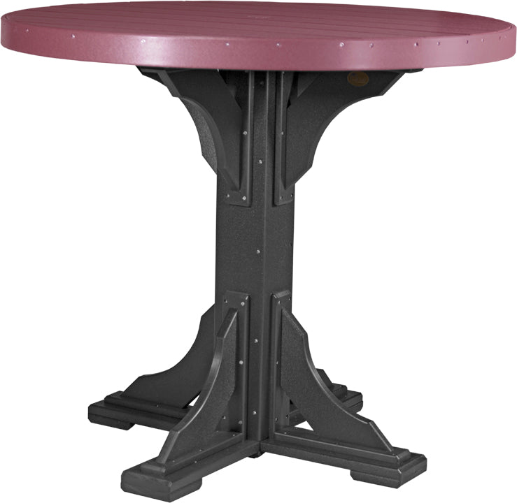 Round 48" table in deep burgundy with black marine-grade base; handcrafted from recycled HDPE for weather resistance.