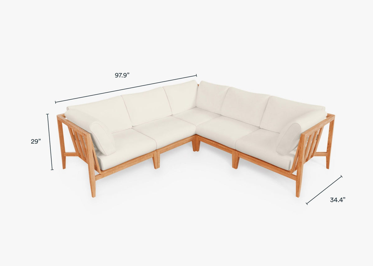 Teak outdoor corner sectional sofa with light cream cushions, featuring a modular design and warm wood frame.