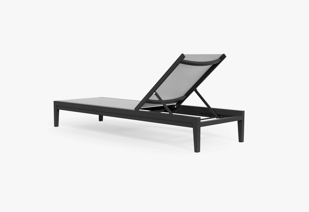 Charcoal aluminum chaise lounge with adjustable backrest and durable sling fabric, showcased in a modern design.