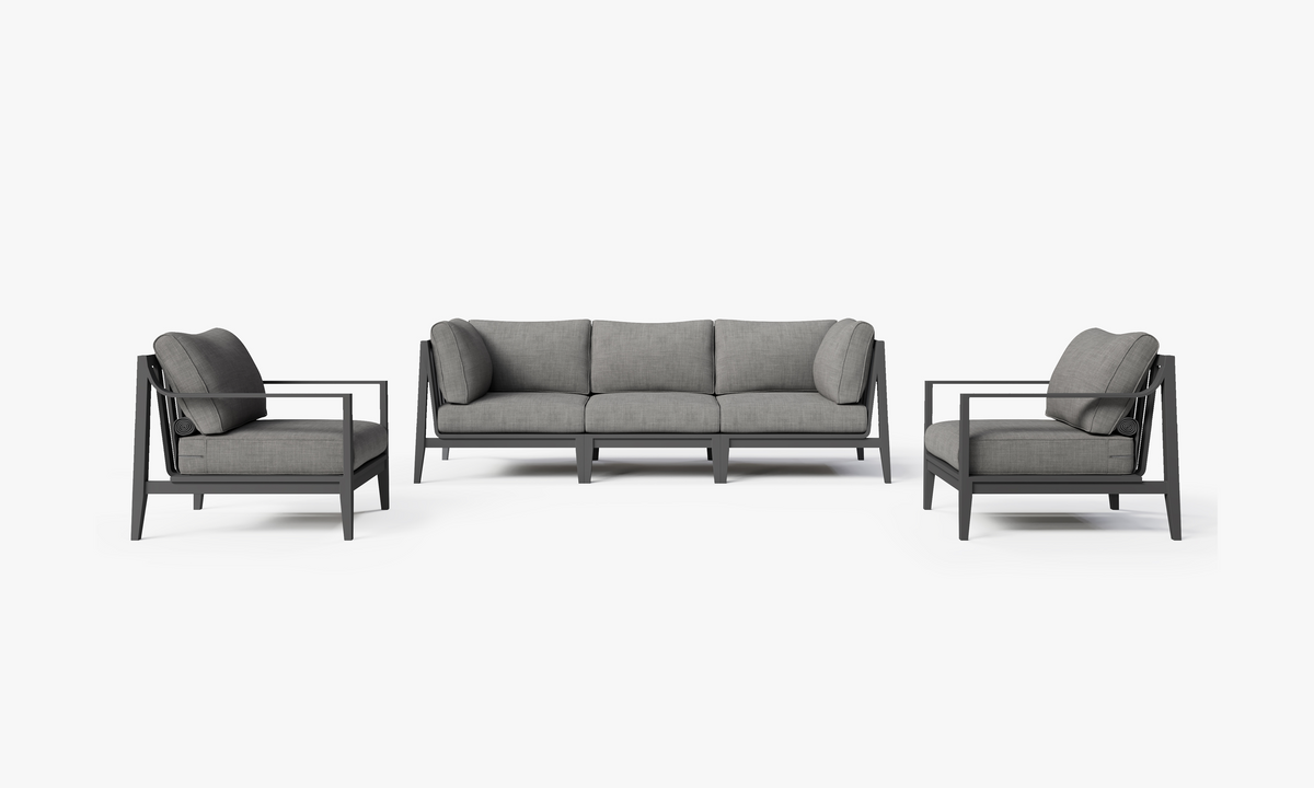 Charcoal aluminum outdoor sofa with two armchairs, featuring plush gray cushions and a sleek modern design.