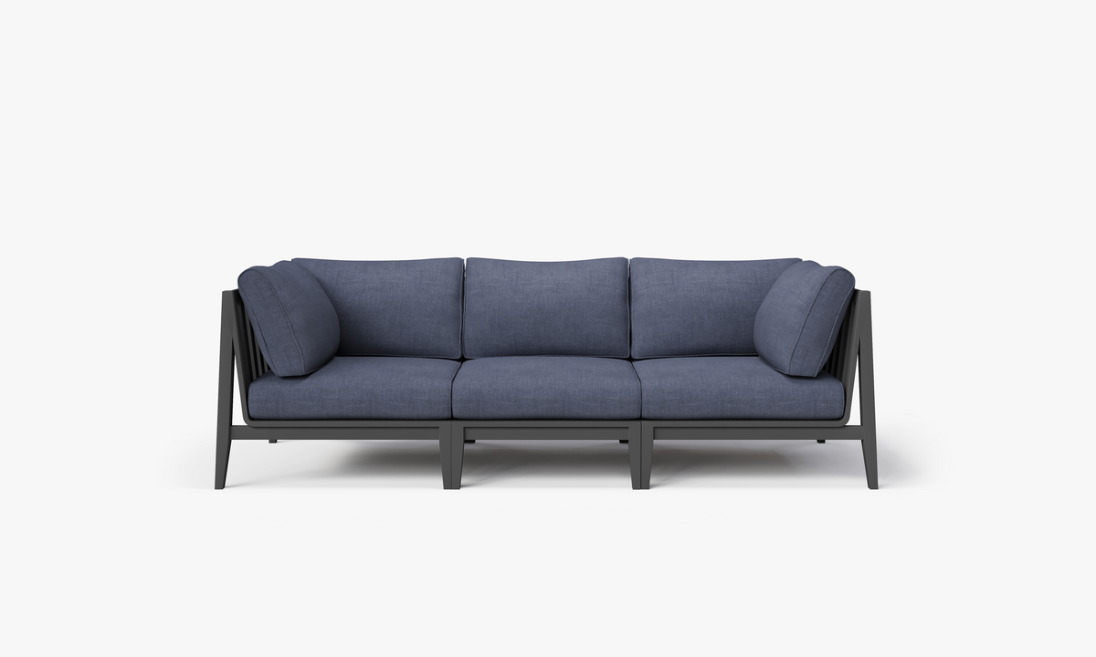 Charcoal aluminum three-seat outdoor sofa with layered memory foam cushions in a modern design and clean lines.