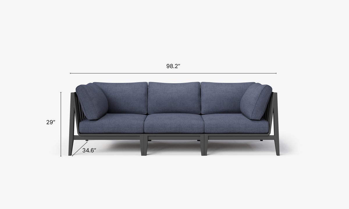 Three-seat outdoor sofa in charcoal aluminum with navy Olefin cushions, featuring a modular design and clean lines.
