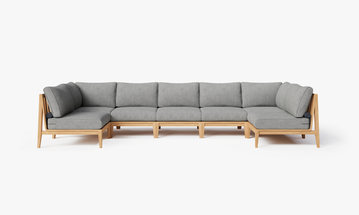 U-shaped sectional sofa with a light wood frame and soft gray cushions, designed for outdoor seating.