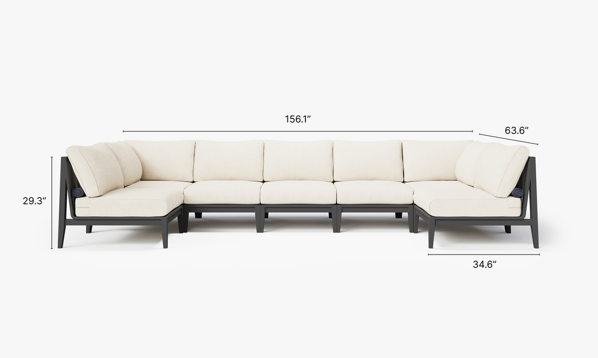 Charcoal aluminum U-shaped sectional sofa with five armless and two corner chairs, featuring cream cushions.