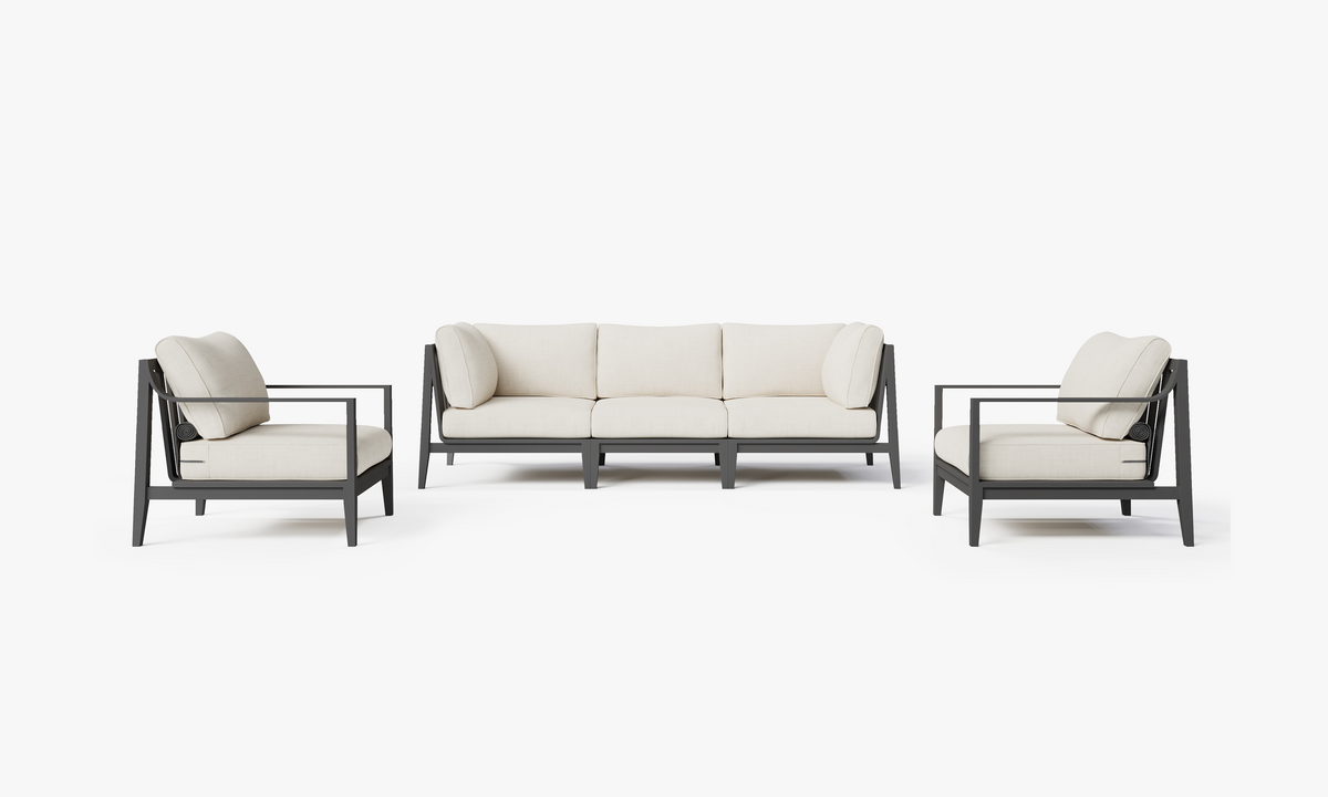 Outer Charcoal Aluminum Outdoor Sofa with Armchairs features a charcoal aluminum frame with cream cushions, arranged in a modular 5-seat setup.