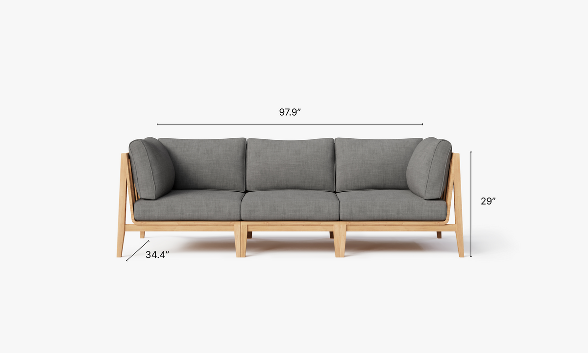Three-seat outdoor sofa featuring a light teak frame and plush gray fabric cushions designed for comfort and style.