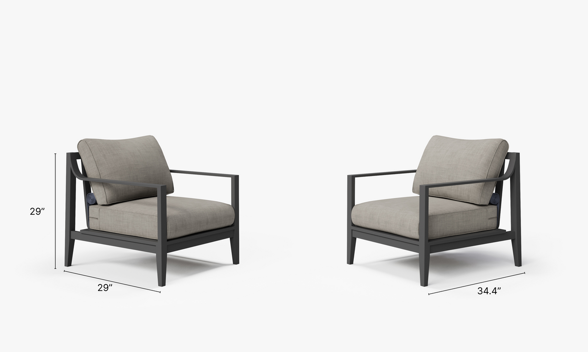 Two charcoal aluminum outdoor armchairs with plush, light gray cushions, featuring a modern design and no assembly required.