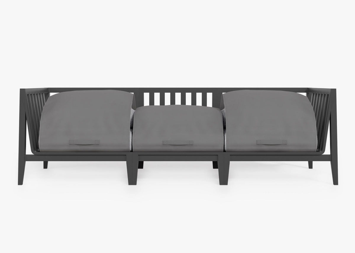 Charcoal aluminum three-seat outdoor sofa with protective covers over memory foam cushions, showcasing a modern design.
