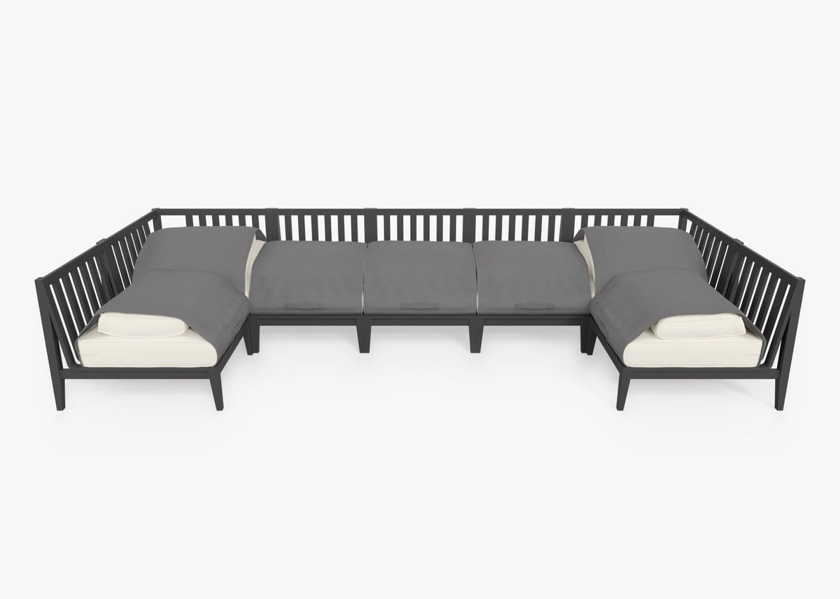 Charcoal aluminum U-shaped sectional sofa with layered gray and cream cushions, designed for outdoor seating.
