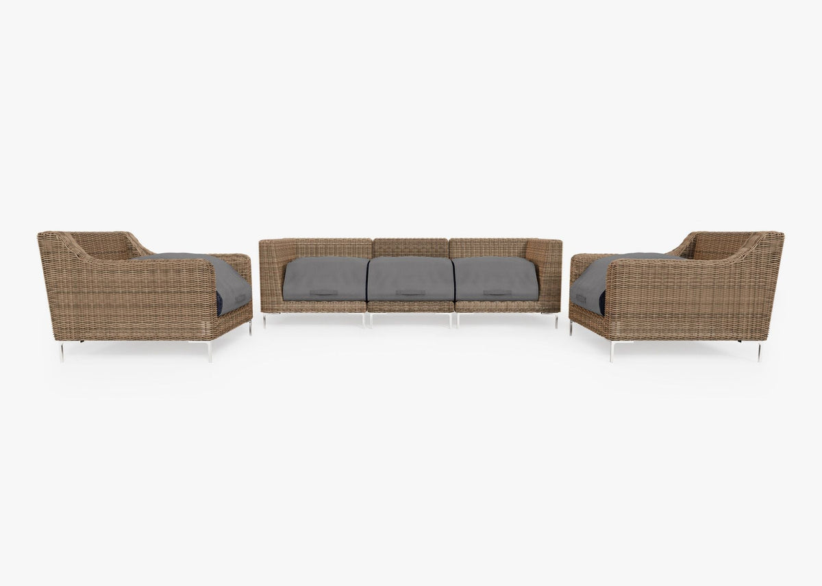 Brown handwoven wicker outdoor sofa set with gray cushions, including two armchairs and a central armless seat.