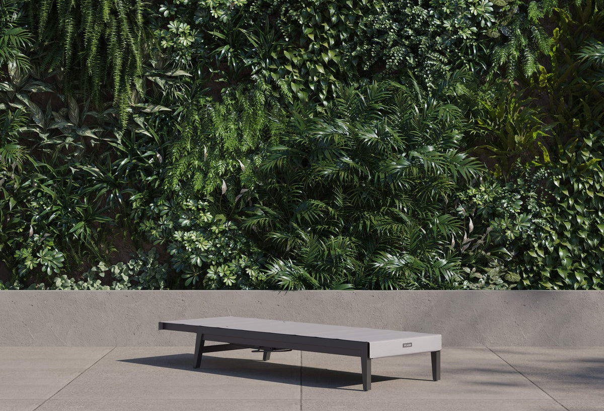 Aluminum Outdoor Infinity Chaise Lounge in gray with a sleek design, adjustable backrest, and integrated cover.