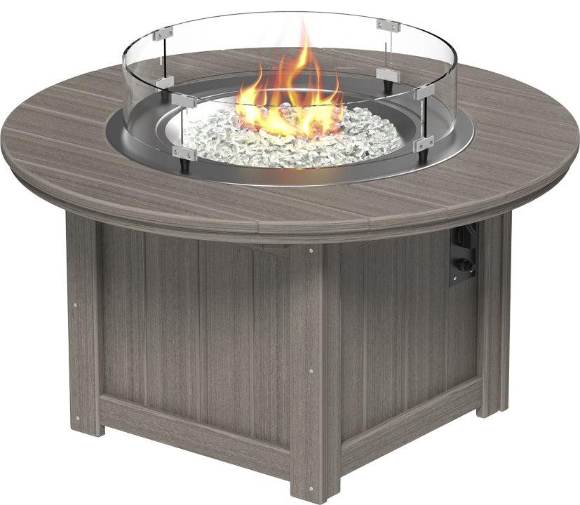 LuxCraft Lumin 46" rectangular fire pit table with a slate gray finish, tempered glass wind guard, and reflective fire glass.