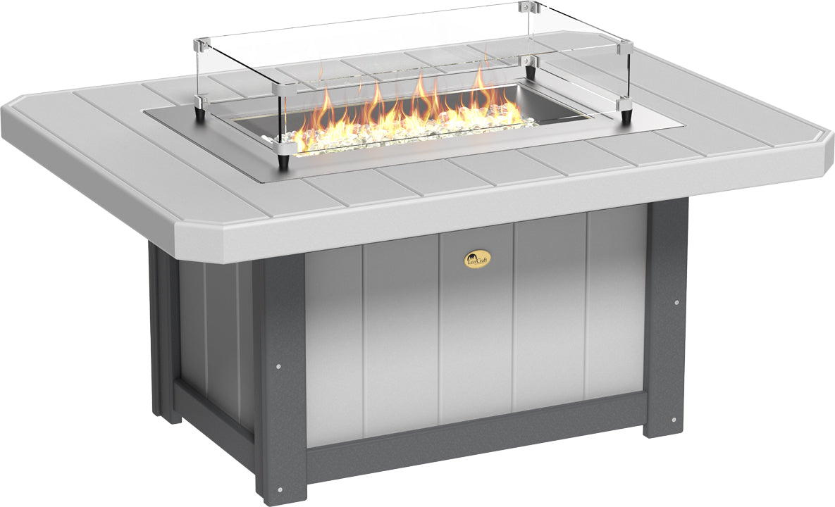 Rectangular LuxCraft Lumin 51" Fire Pit Table in gray HDPE with glass wind guard and flames over reflective fire glass.