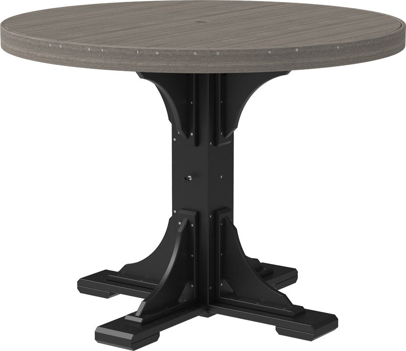 Round table with a textured gray top and a sturdy black base, suitable for outdoor dining. Umbrella hole included.