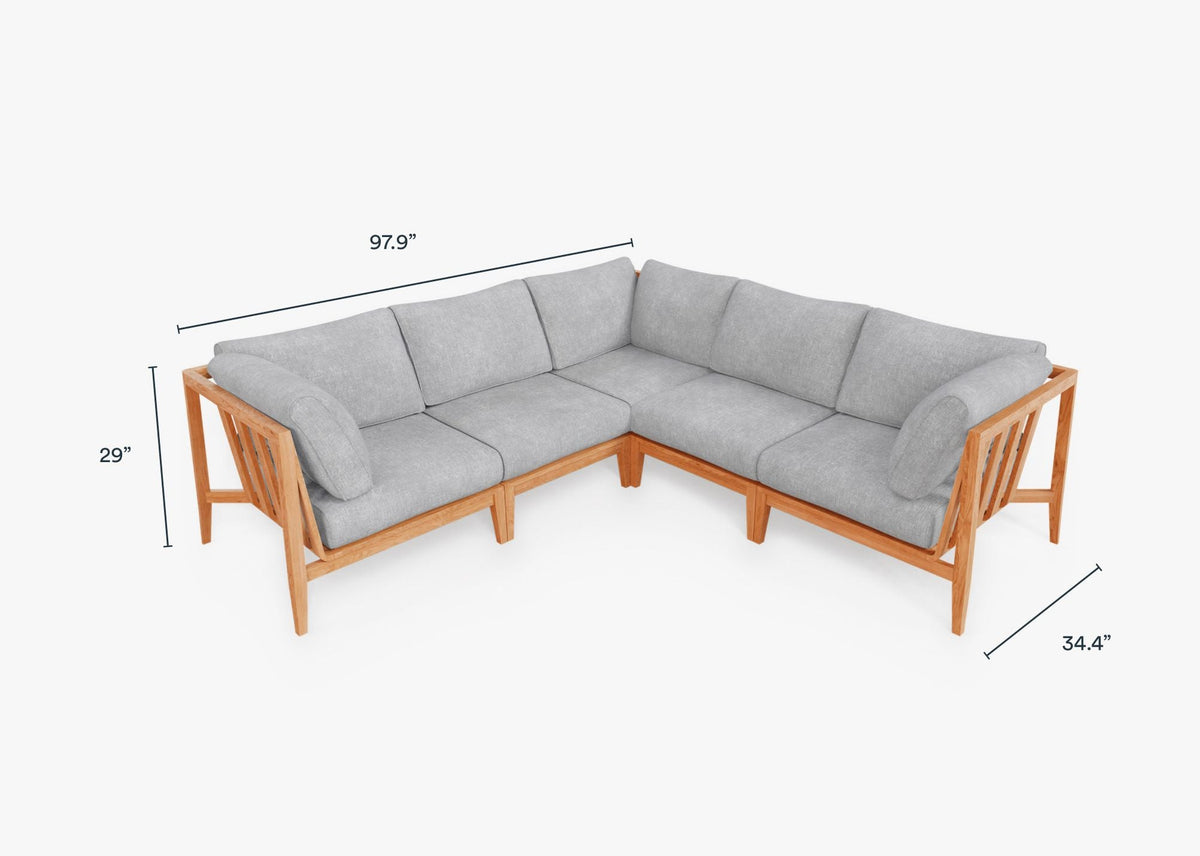 Teak outdoor corner sectional sofa with plush gray cushions, modular design, and natural wood frame.