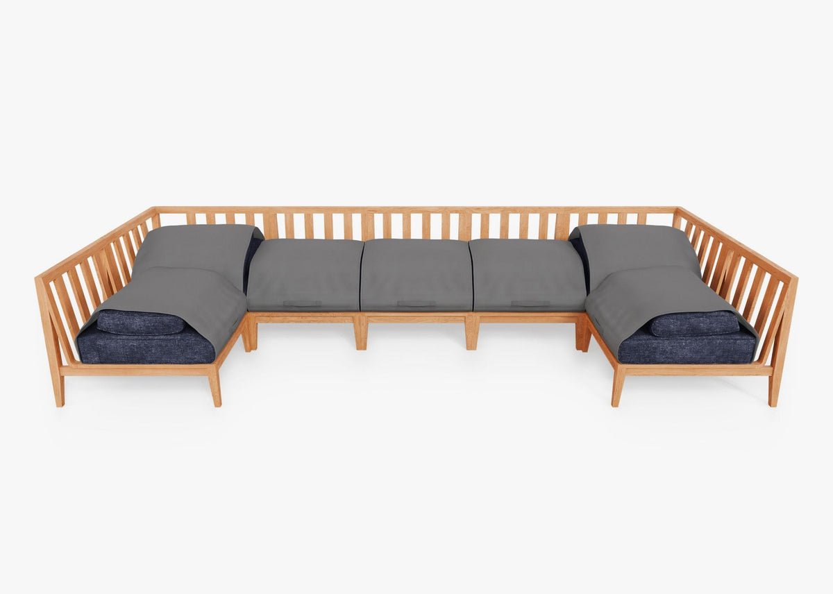 Teak outdoor U-shaped sectional sofa with gray cushions and wooden slatted frame, designed for seven seats.