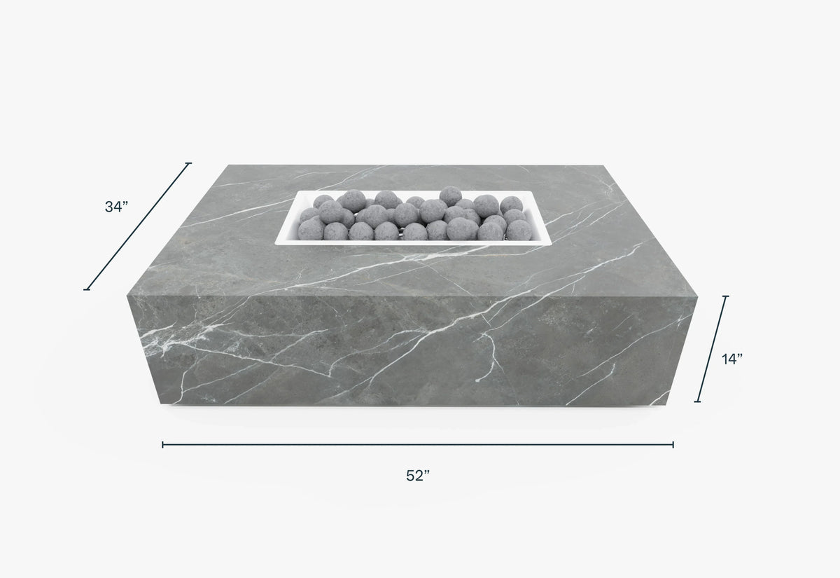Rectangular OuterStone® fire pit table with a sleek gray finish, featuring a central compartment with ceramic spheres.