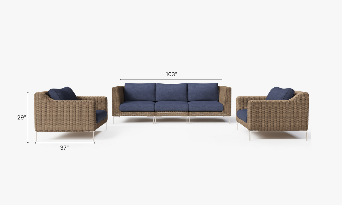 Brown handwoven wicker outdoor sofa set featuring two corner chairs, two armchairs, and blue cushions.