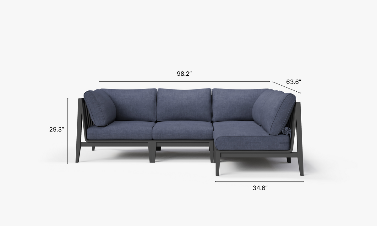 Charcoal aluminum L sectional sofa with deep blue cushions, featuring a modern design and modular seating arrangement.
