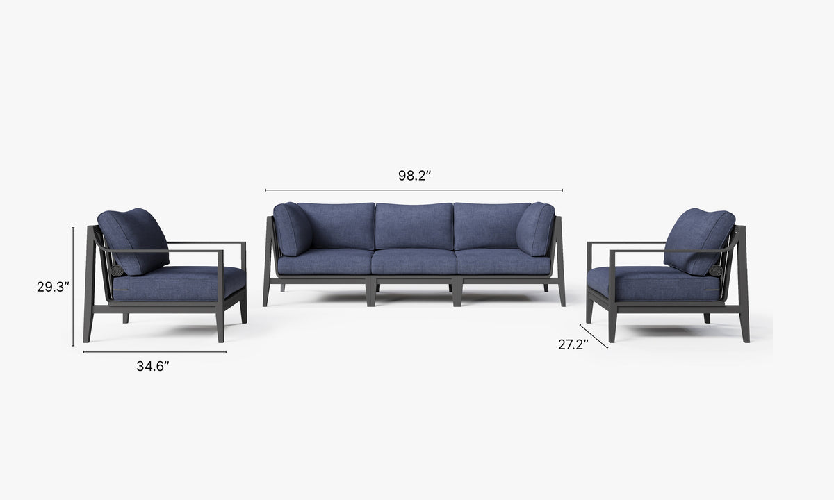 Charcoal aluminum outdoor sofa set with plush navy cushions; includes two armchairs and a modular design for flexible arrangement.