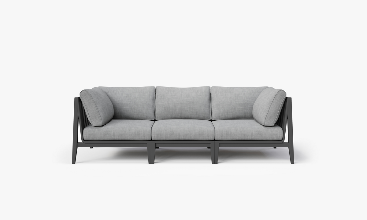 Charcoal aluminum three-seat outdoor sofa with gray fabric cushions, featuring a modern modular design and slanted arms.