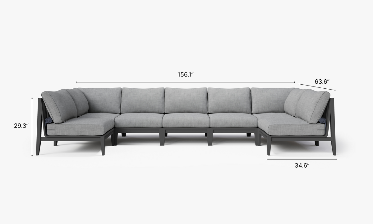 Charcoal aluminum U-shaped sectional sofa with layered gray cushions, designed for seven-seat outdoor lounging.