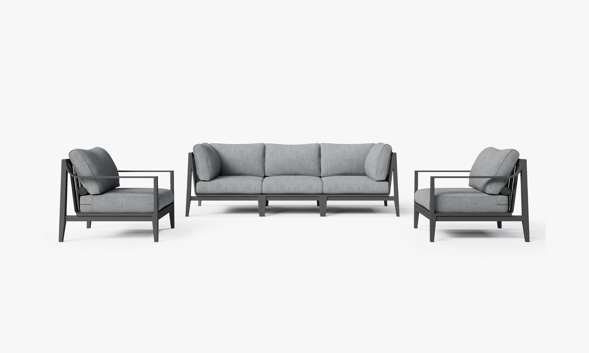 Charcoal aluminum outdoor sofa set featuring five modular pieces with plush gray cushions and minimalist armchairs.