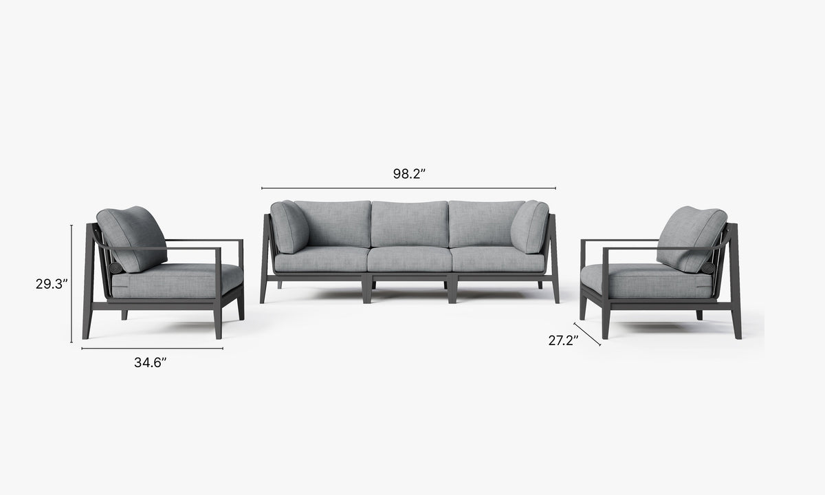 Charcoal aluminum outdoor sofa set with plush gray cushions, featuring two armchairs and modular seating arrangement.
