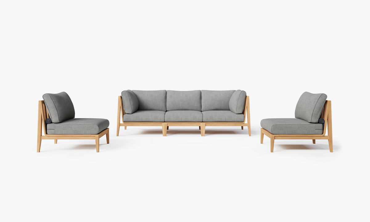 Teak outdoor sofa set with gray Olefin cushions, featuring a three-seat sofa and two armless chairs, showcasing clean lines.