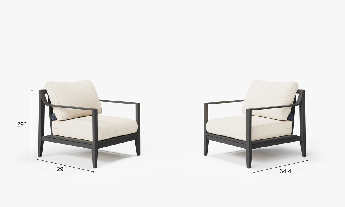 Charcoal aluminum armchair set with plush cream cushions, modern design, and sleek frames, ideal for outdoor seating.