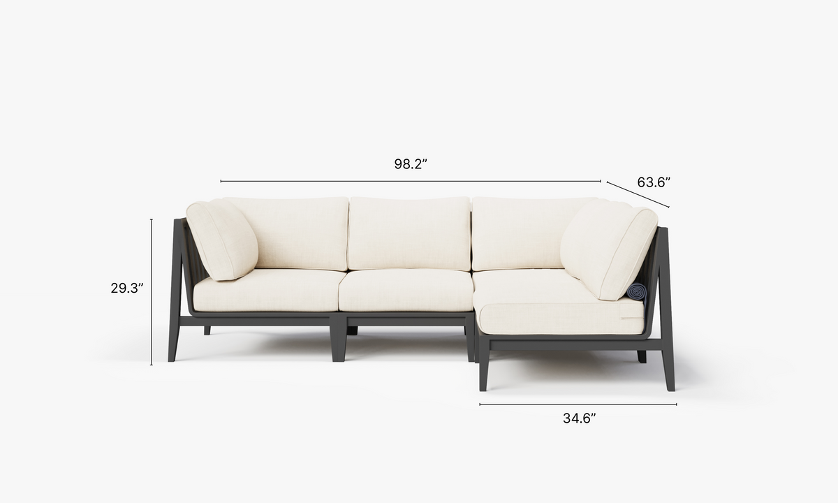 Charcoal aluminum L-shaped sectional sofa with cream cushions, featuring a modular design for outdoor seating.