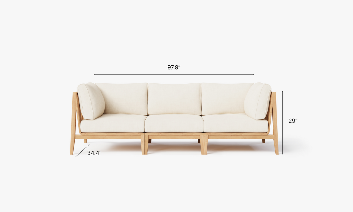 Three-seat outdoor sofa with a natural teak frame and plush cream cushions. Modular design for flexible seating arrangements.