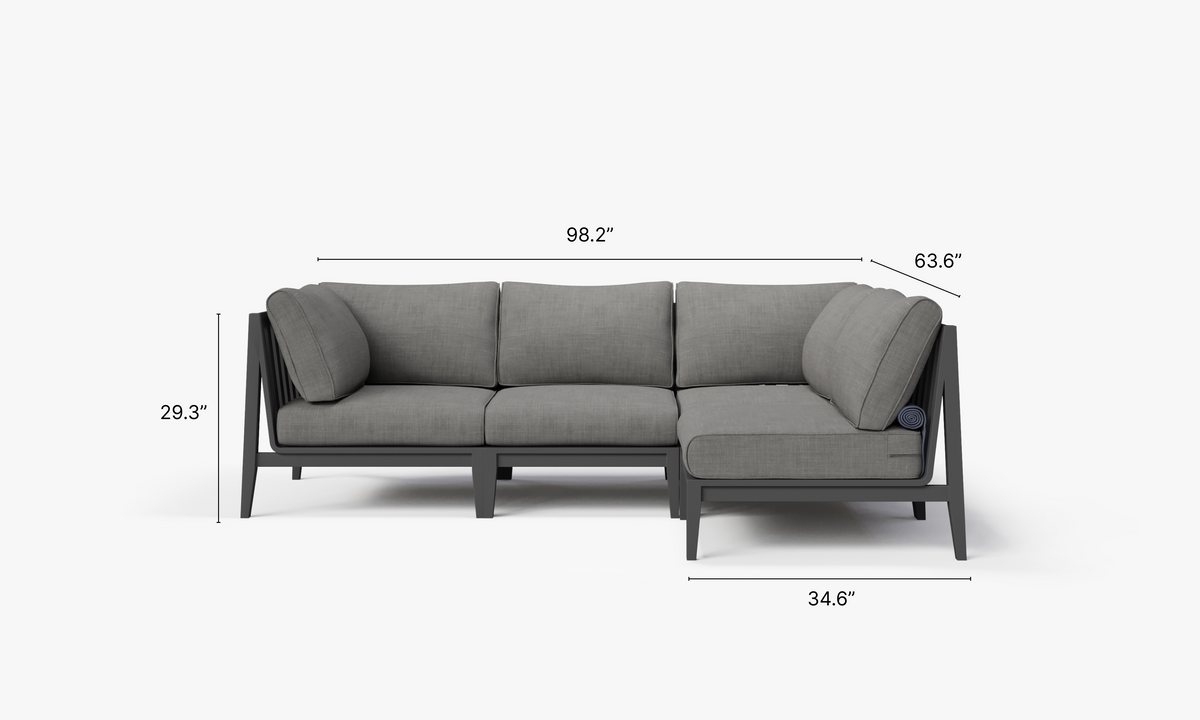 Charcoal aluminum outdoor L-shaped sectional with comfortable gray cushions, designed to seat four.