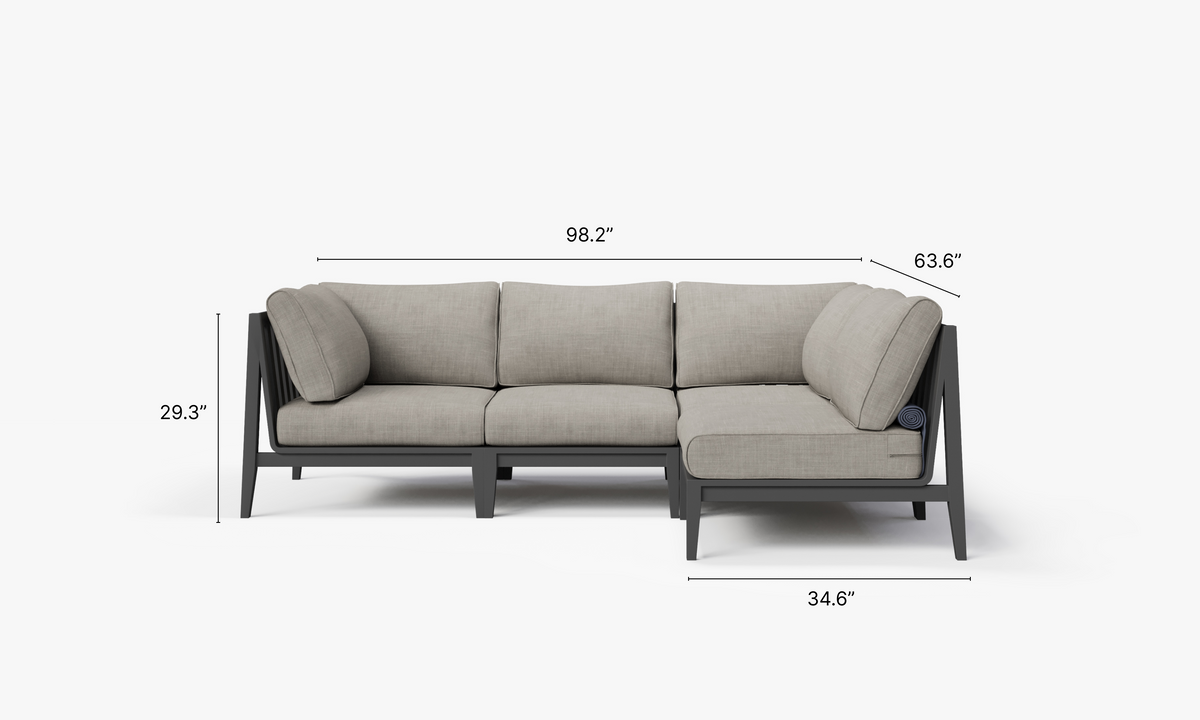 Charcoal aluminum L-shaped sectional sofa with soft gray cushions, featuring a modern design and modular layout.