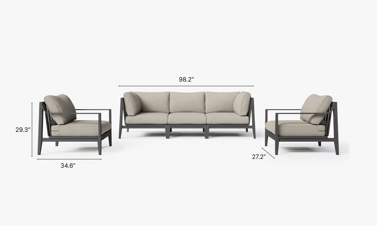 Charcoal aluminum outdoor sofa set with plush light gray cushions, modular design featuring two armchairs and a central sofa.